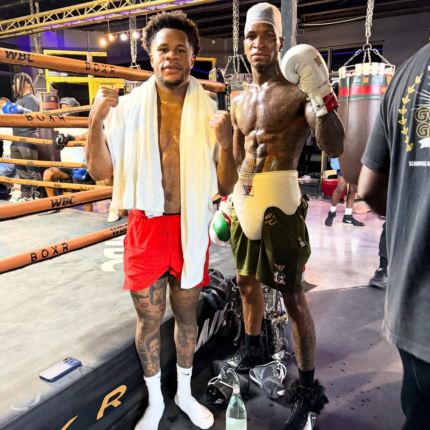 Howard Davis wearing BOXELITE S-PRO boxing gloves posing with world champion Devin Haney after a sparring session in Miami